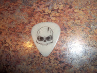 Guitar Pick Medium Celluloid – Glow Scans Skull – Black on Glow Plastic