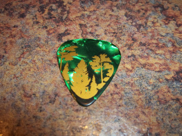 Guitar Pick Medium Celluloid - Pine Trees - Gold on Green Pearl Plastic