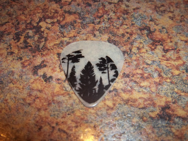 Guitar Pick Medium Celluloid - Pine Trees - Black on Glow Plastic