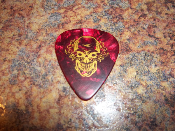 Guitar Pick Medium Celluloid - Skull - Gold on Red Pearl Plastic