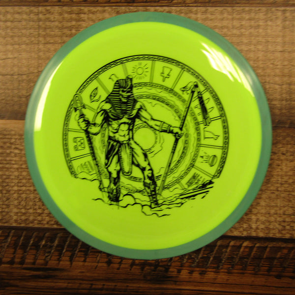 Axiom Fireball Neutron Distance Driver Egyptian Standing in Clouds Disc Golf Disc 168 Grams Green Yellow