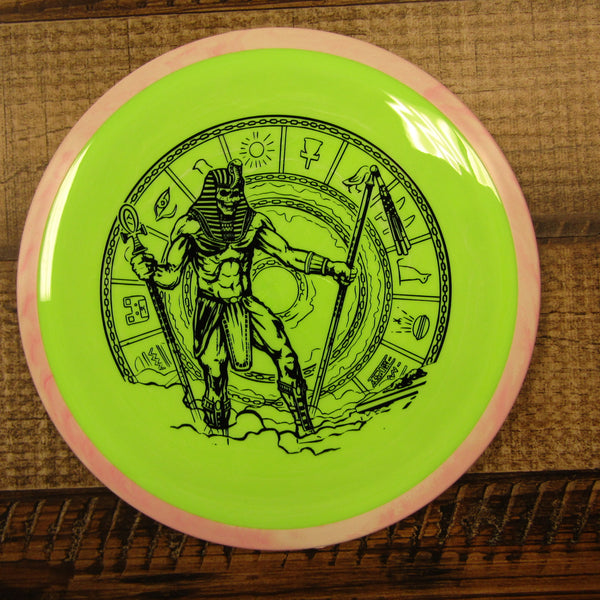 Axiom Fireball Neutron Distance Driver Egyptian Standing in Clouds Disc Golf Disc 168 Grams Green Pink