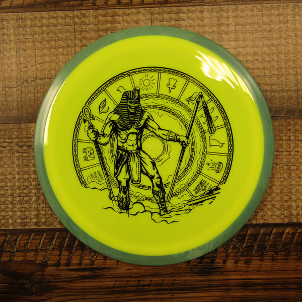 Axiom Fireball Neutron Distance Driver Egyptian Standing in Clouds Disc Golf Disc 169 Grams Yellow Green